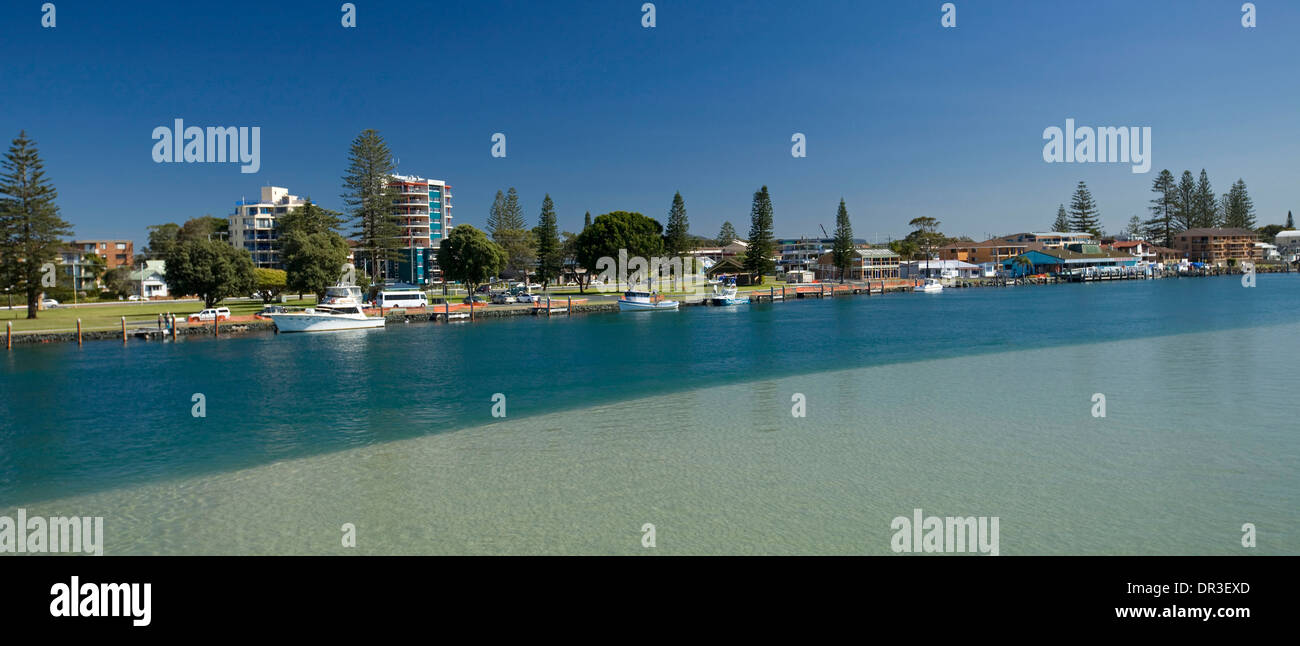 Spectacular panoramic view of blue waters of Wallis Lake and skyline of coastal city of Tuncurry in Great Lakes region NSW Aust Stock Photo