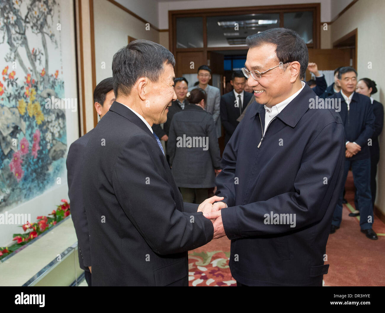 Beijing, China. 19th Jan, 2014. Chinese Premier Li Keqiang (R) talks with actor Li Xuejian after a forum in Beijing, capital of China, Jan. 17, 2014. Li listened to people from science, education, culture, medical and sports circles and the public at large while drafting a government work report at a forum held on Friday. A total of 10 representatives shared their views on the government's work in 2013 and made some suggestions to improve the report at the forum, according to a circular published on Sunday. © Huang Jingwen/Xinhua/Alamy Live News Stock Photo