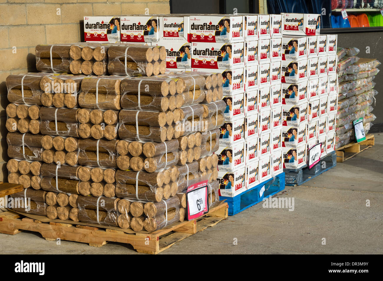 Pallets of pressed wood fuel made from sawdust for use in heating homes