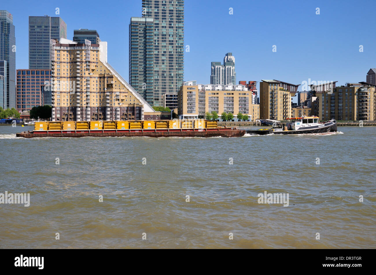 Waste transfer barge, River Thames, Canary Wharf, London, United Kingdom Stock Photo