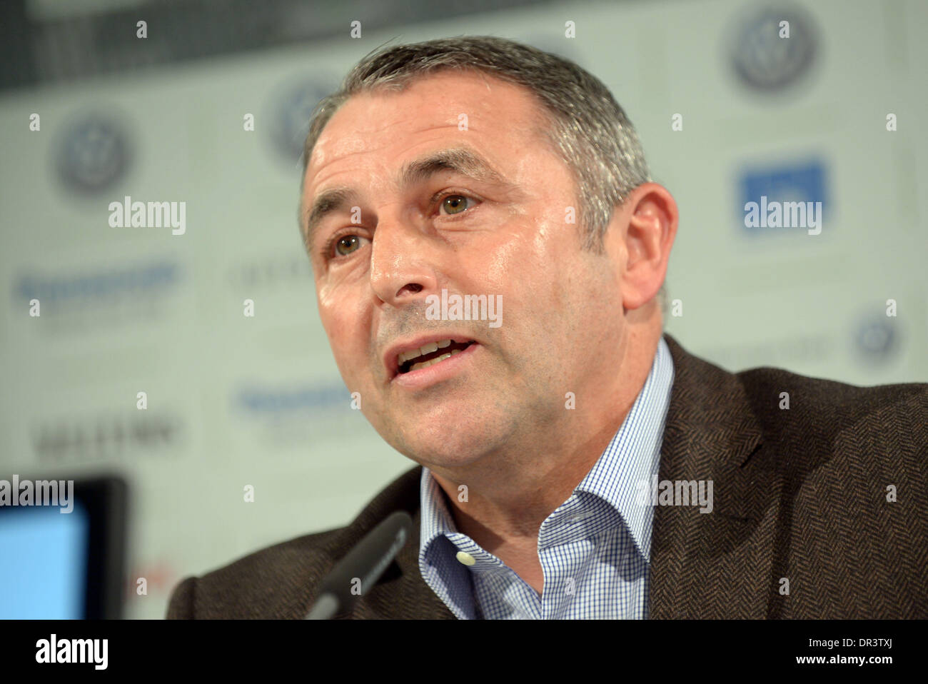 Wolfsburg's manager Klaus Allofs speaks during a press conference in Wolfsburg, Germany, 19 January 2014. Photo: Peter Steffen/dpa Stock Photo