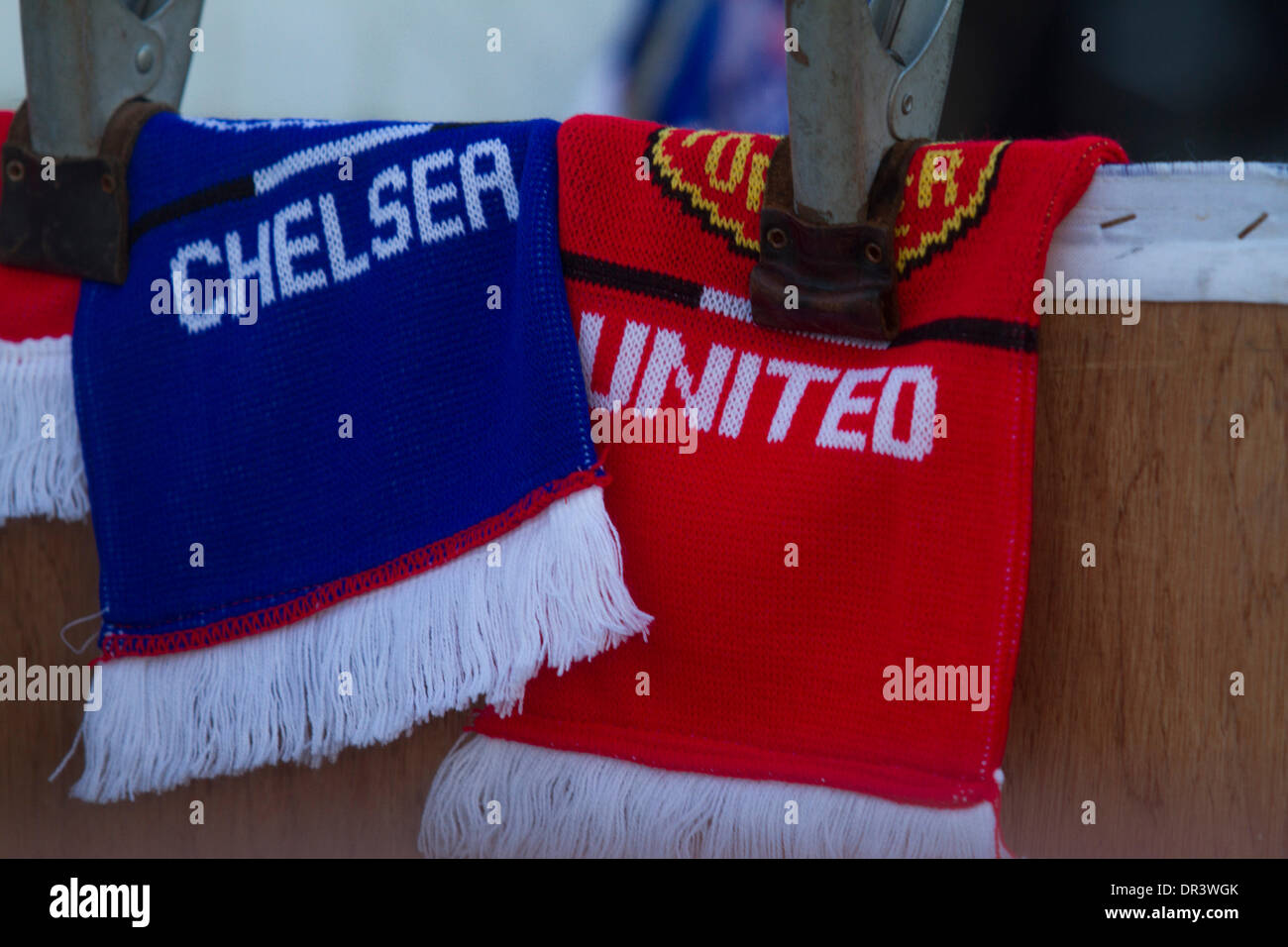 London UK. 19th January 2014. Football scarves on sale as fans gather ahead of the English premier league match between Chelsea and Manchester United at Stamford Bridge Credit:  amer ghazzal/Alamy Live News Stock Photo