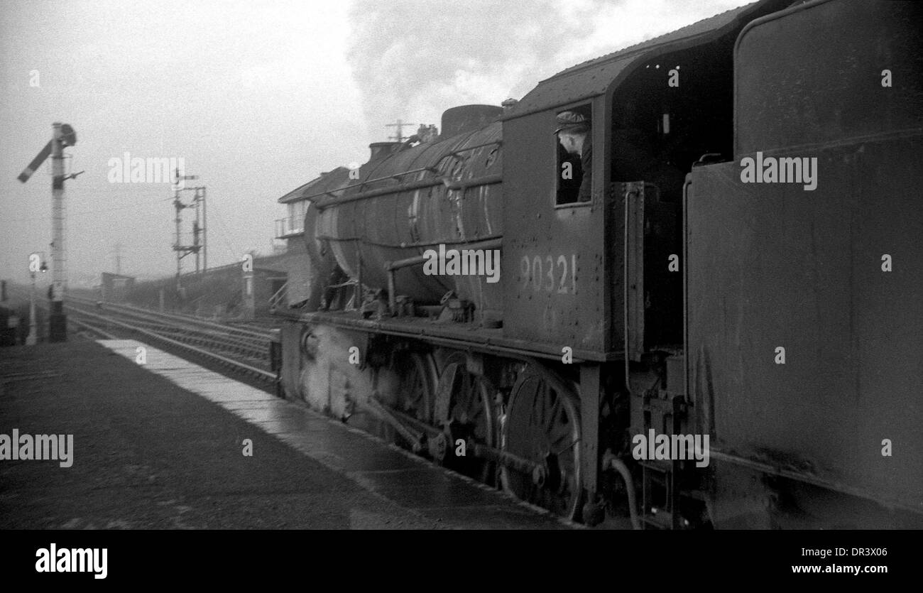 British Railways steam locomotive WD 2-8-0 90321 at  Boldon Colliery station, north east England 1967 Stock Photo