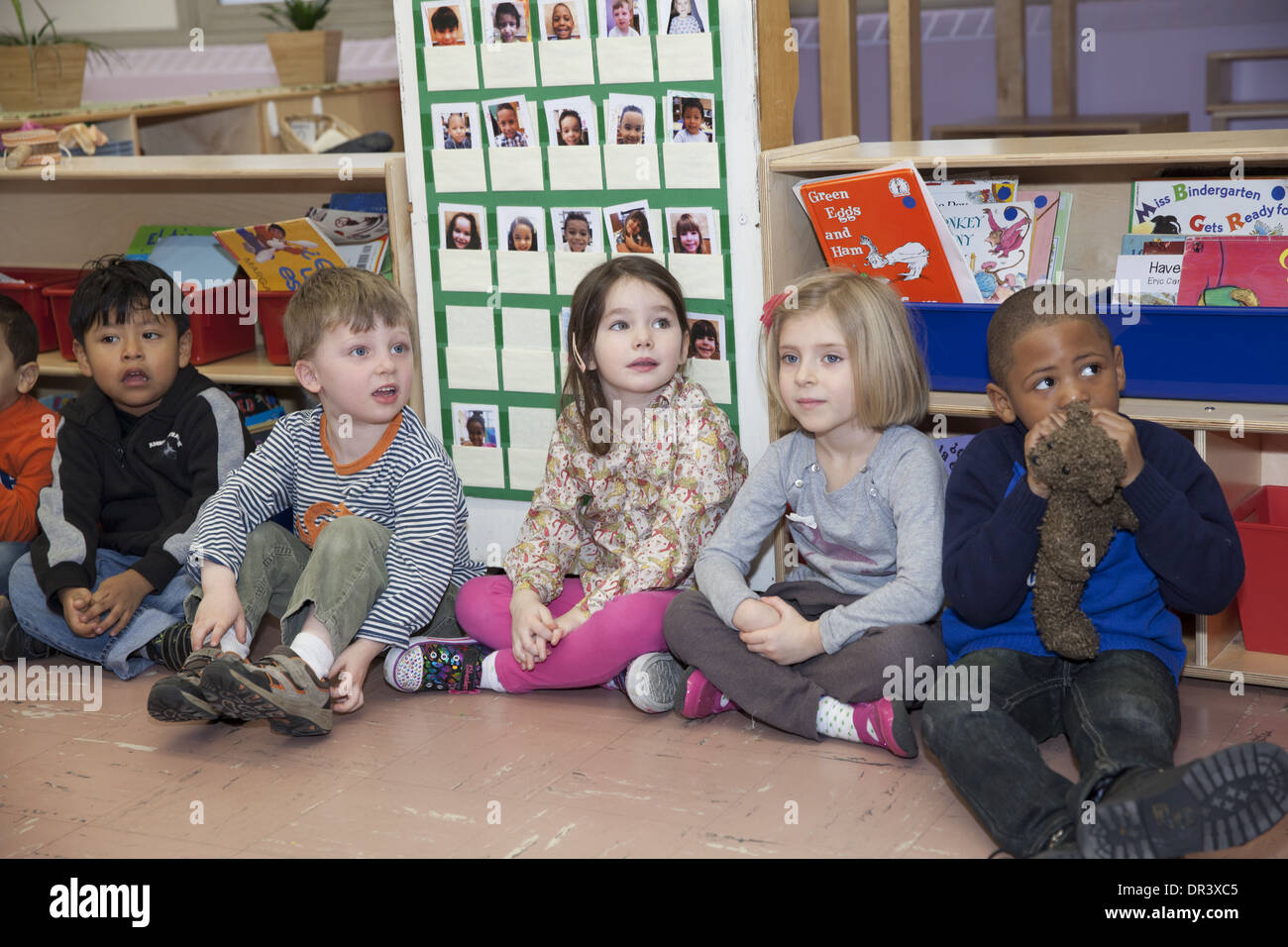 Active elementary school class at a public elementary school in upper Manhattan, NYC. Stock Photo