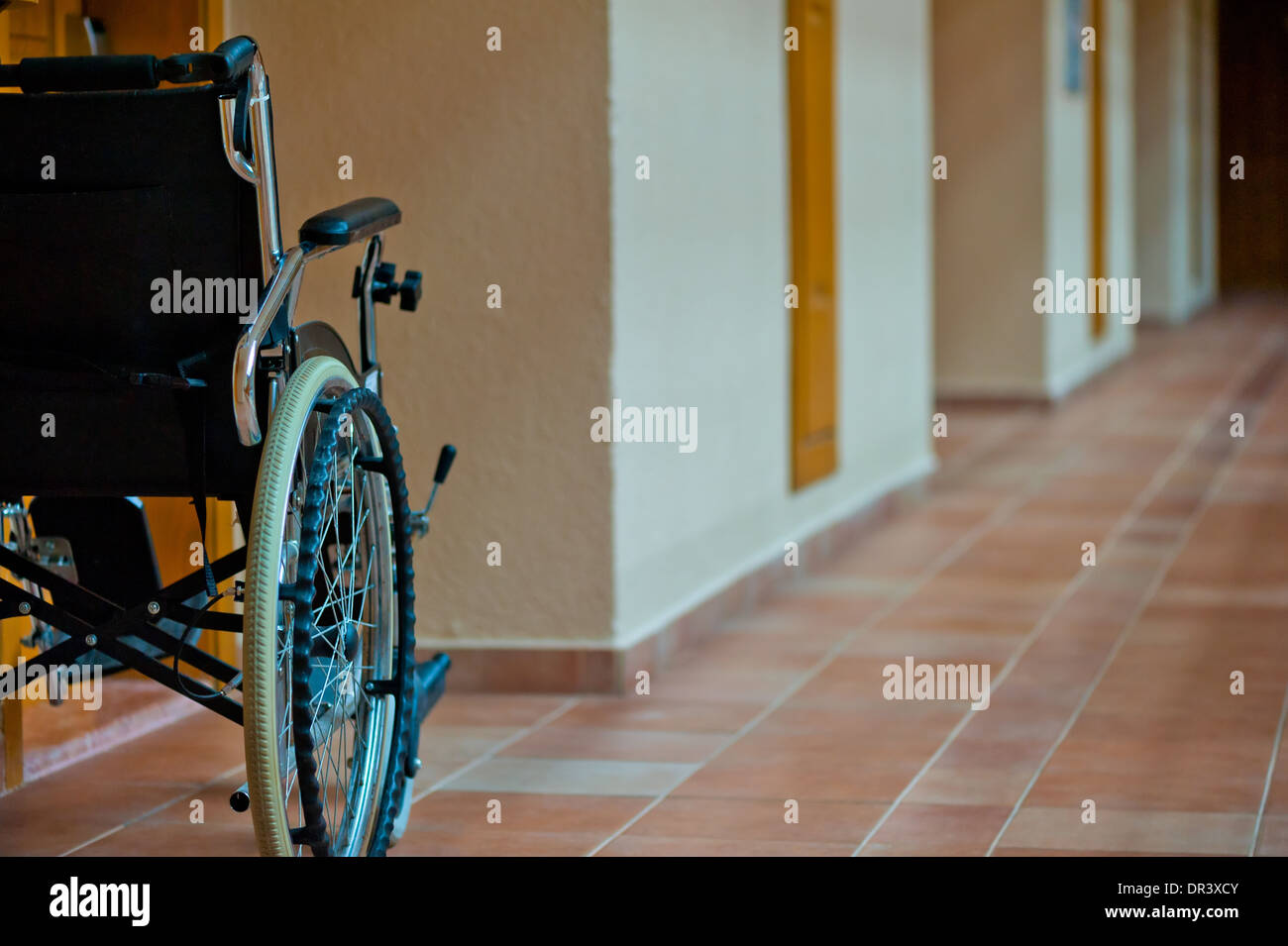 empty wheelchair in the hallway for the disabled Stock Photo