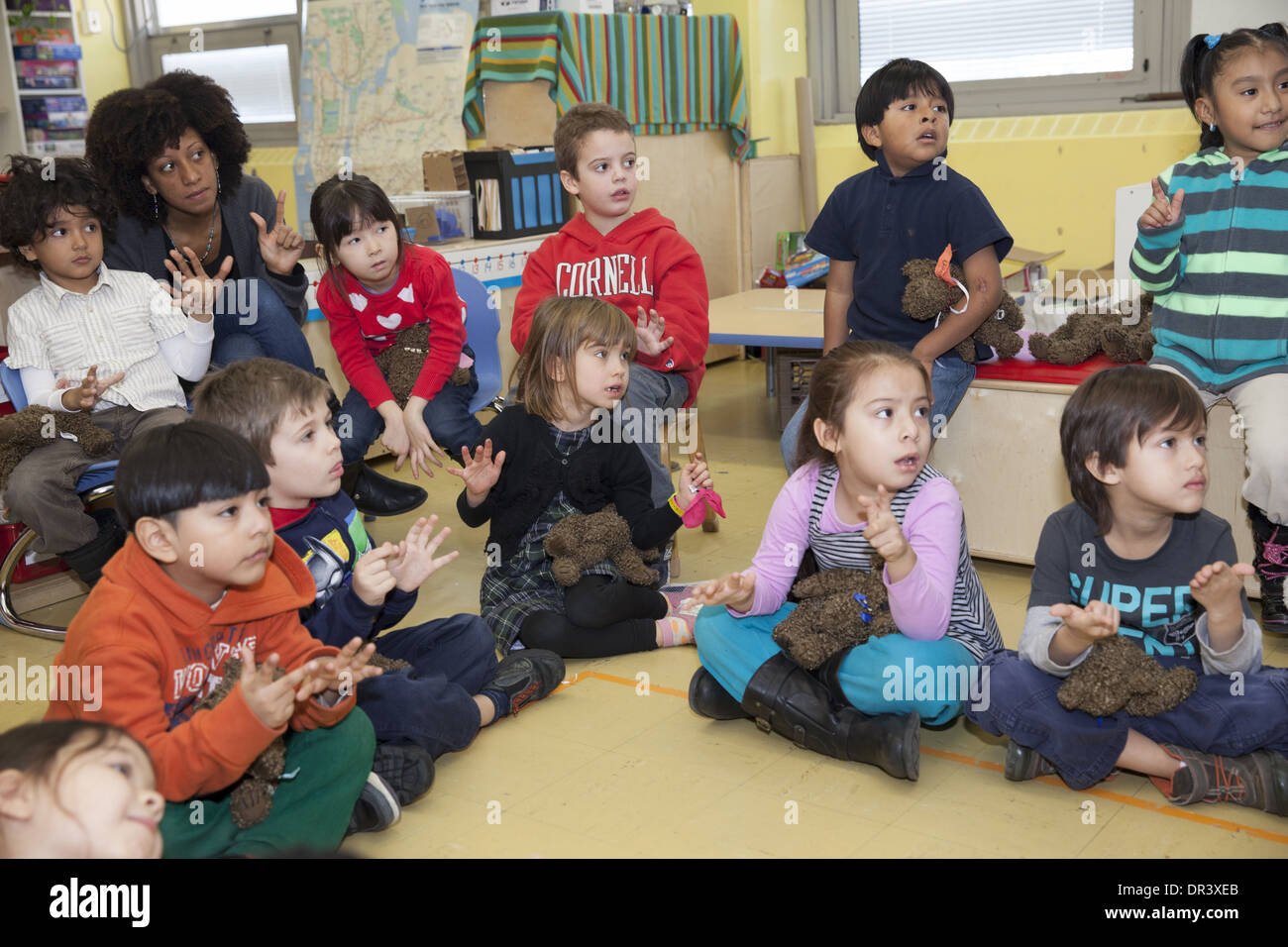Active primary school class at a New York City  public elementary school in upper Manhattan, NYC. Stock Photo