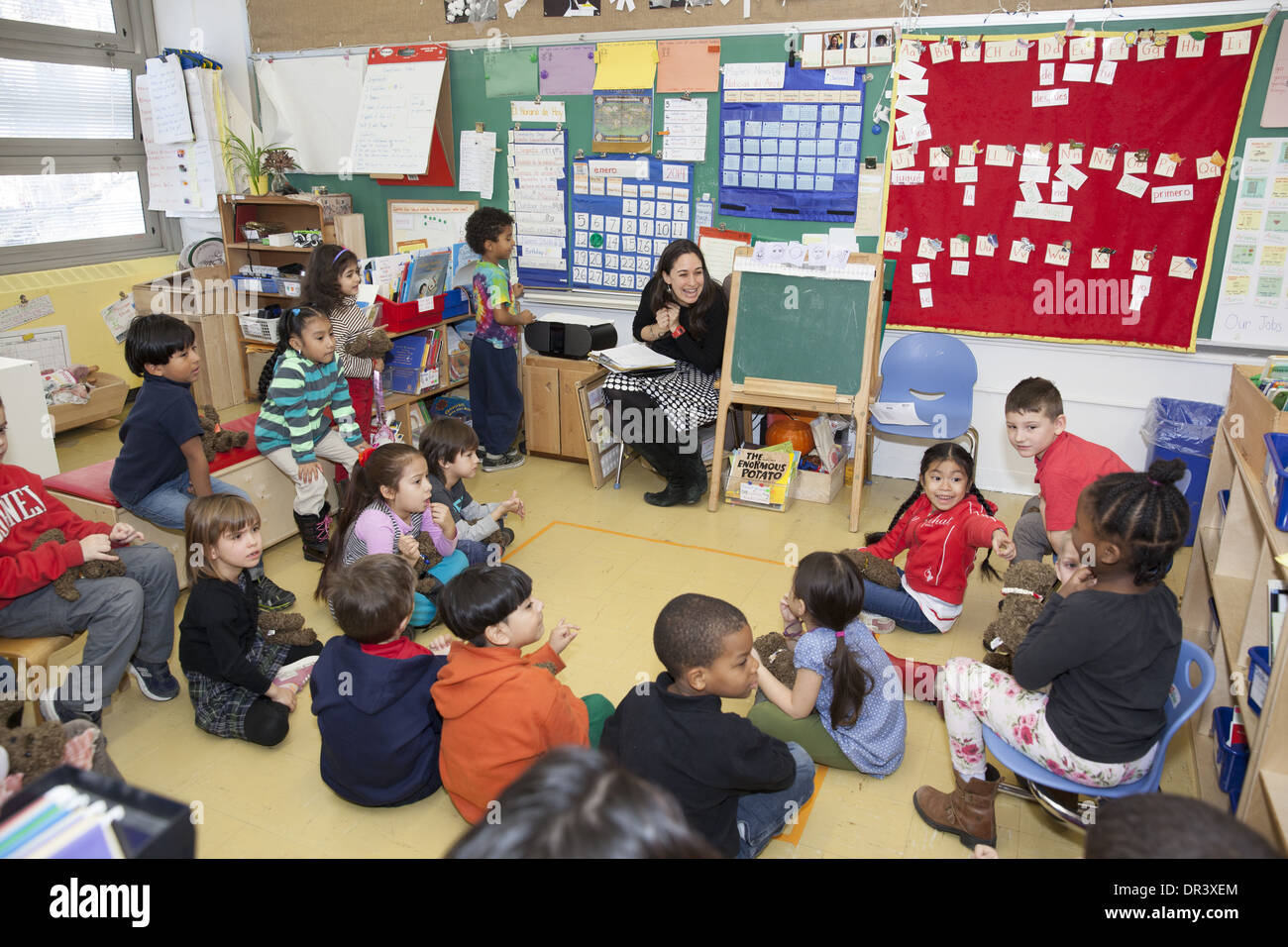Active bi-lingual elementary school class at a public elementary school in upper Manhattan, NYC. Stock Photo