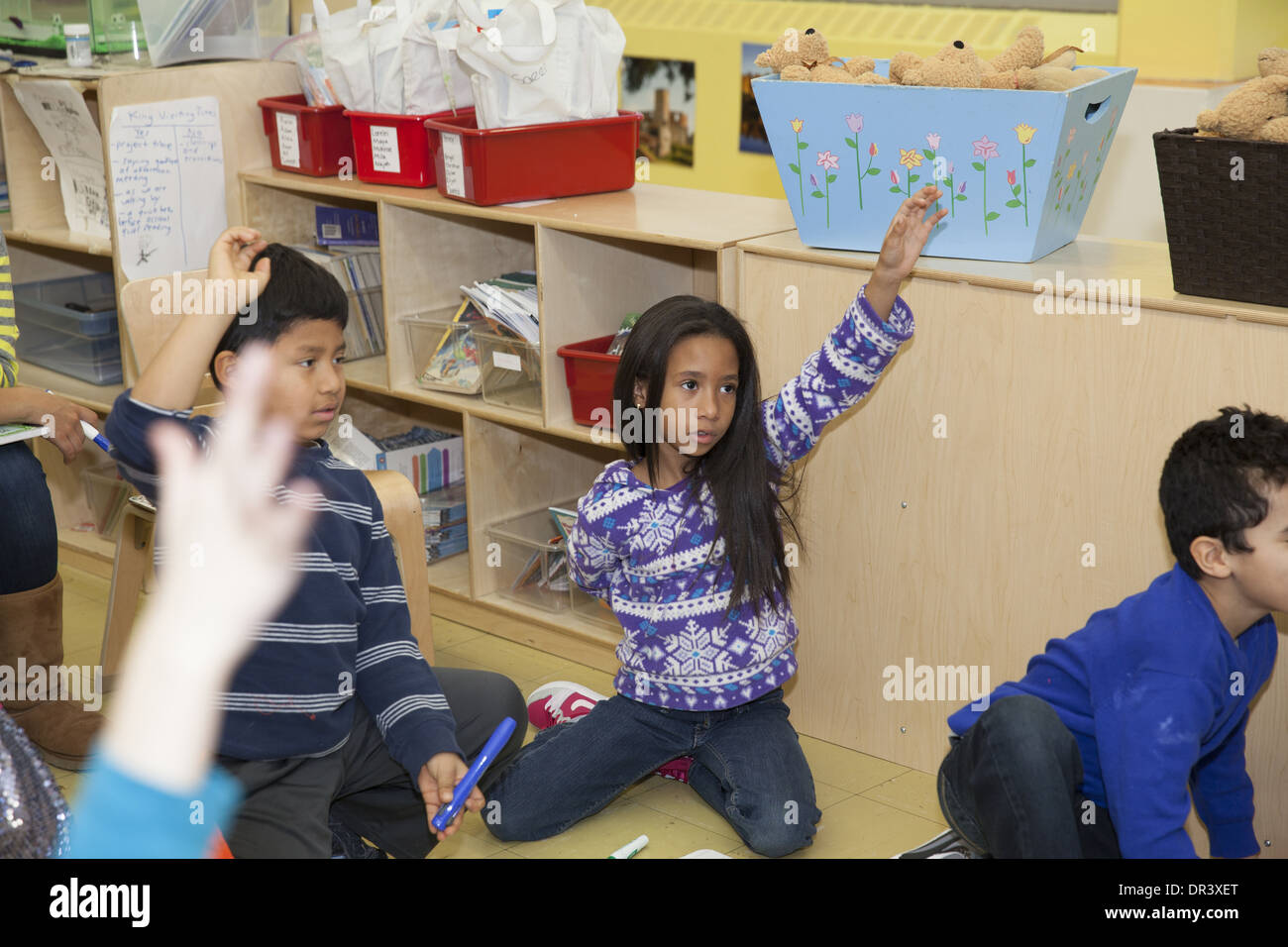 Active elementary school class at the Castle Bridge public elementary school in upper Manhattan, NYC. Stock Photo