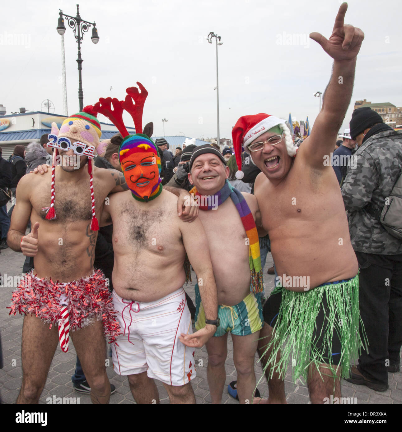 All sorts of people came out for the annual Polar Bear Club New Years Day 2014 plunge into the icy Atlantic at Coney Island. Stock Photo