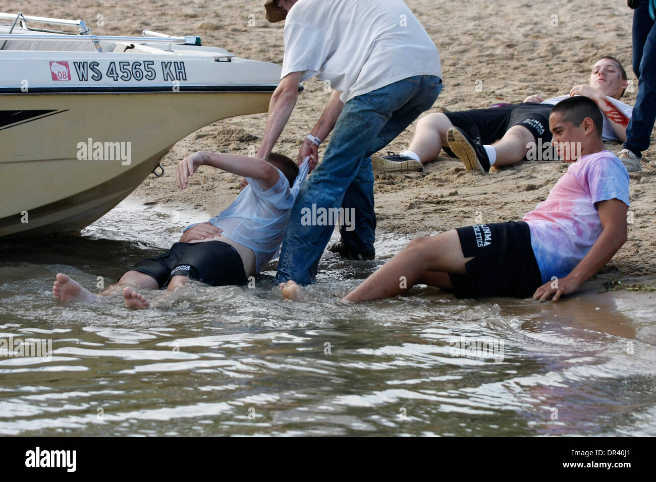 Multiple boating accident victims on a beach in Wisconsin Stock Photo