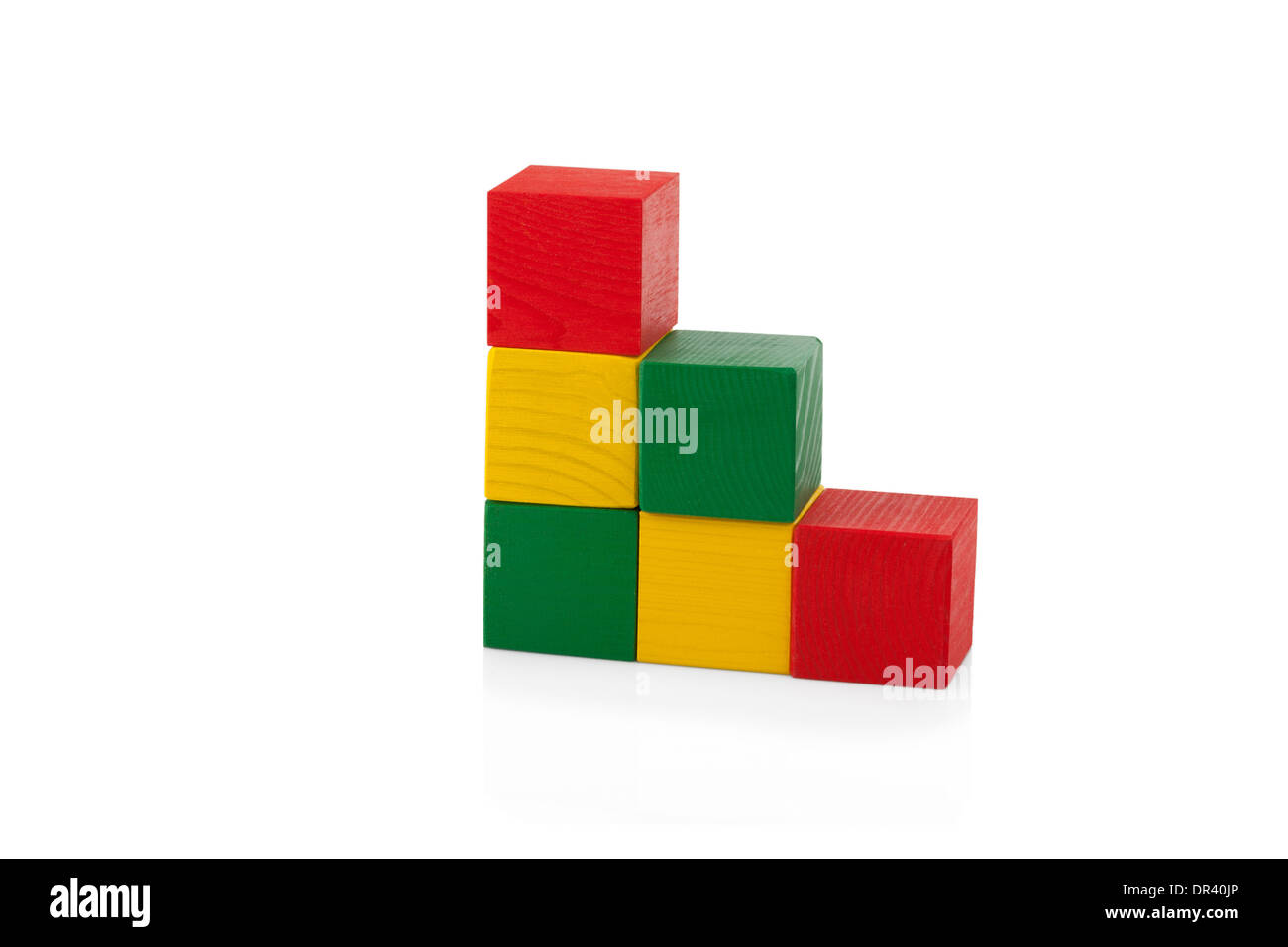 Wooden blocks, pyramid of colorful cubes, childrens toy isolated on white background Stock Photo