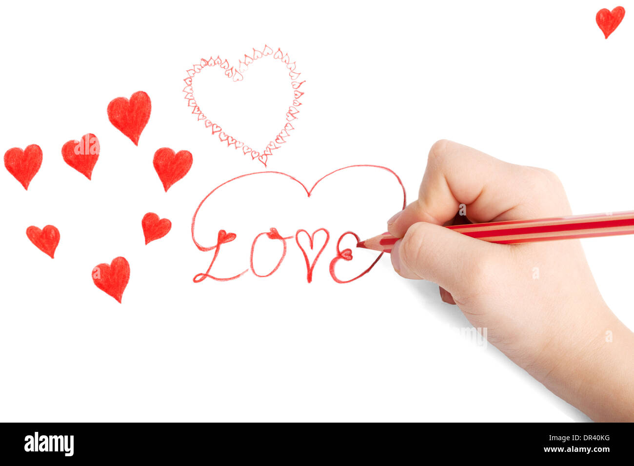 Child's hand drawing Saint Valentine card with hearts Stock Photo