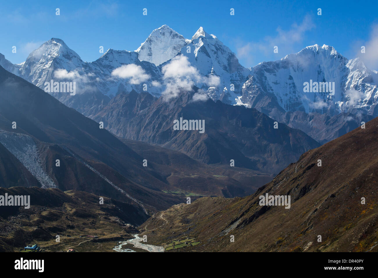 Snow covered mountains in Himalayas Stock Photo