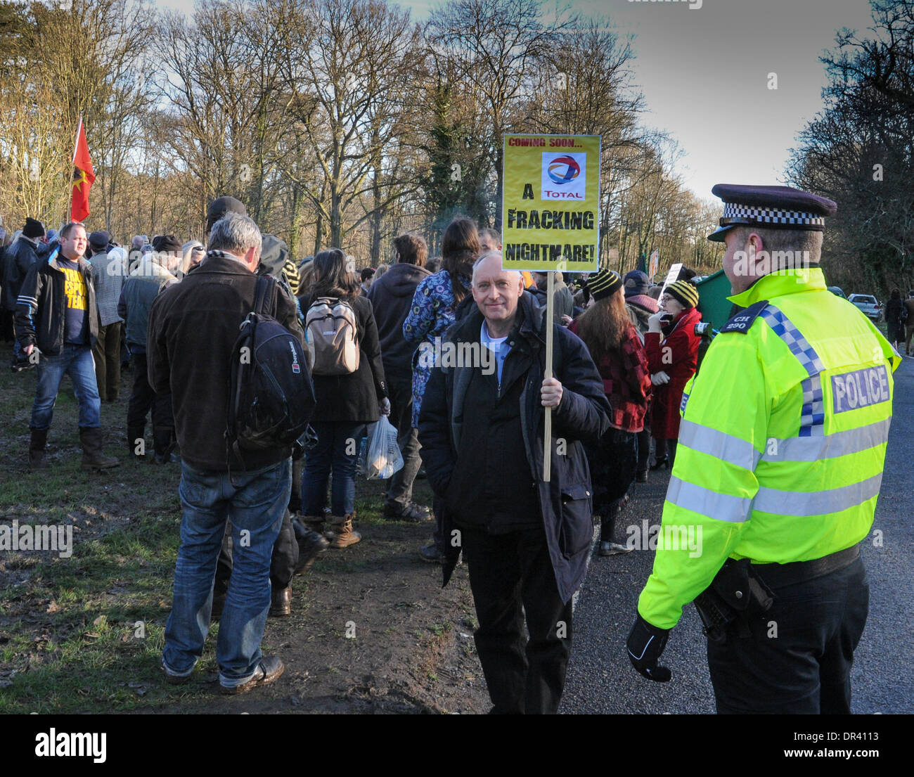 Balcombe, West Sussex, UK. 19th Jan, 2014. Anti-fracking protesters meet outside Cuadrilla's site in Balcombe West Sussex. Pictured: Anti Fracking environmentalist makes his point outside the Cuadrilla site in West Sussex Credit:  David Burr/Alamy Live News Stock Photo
