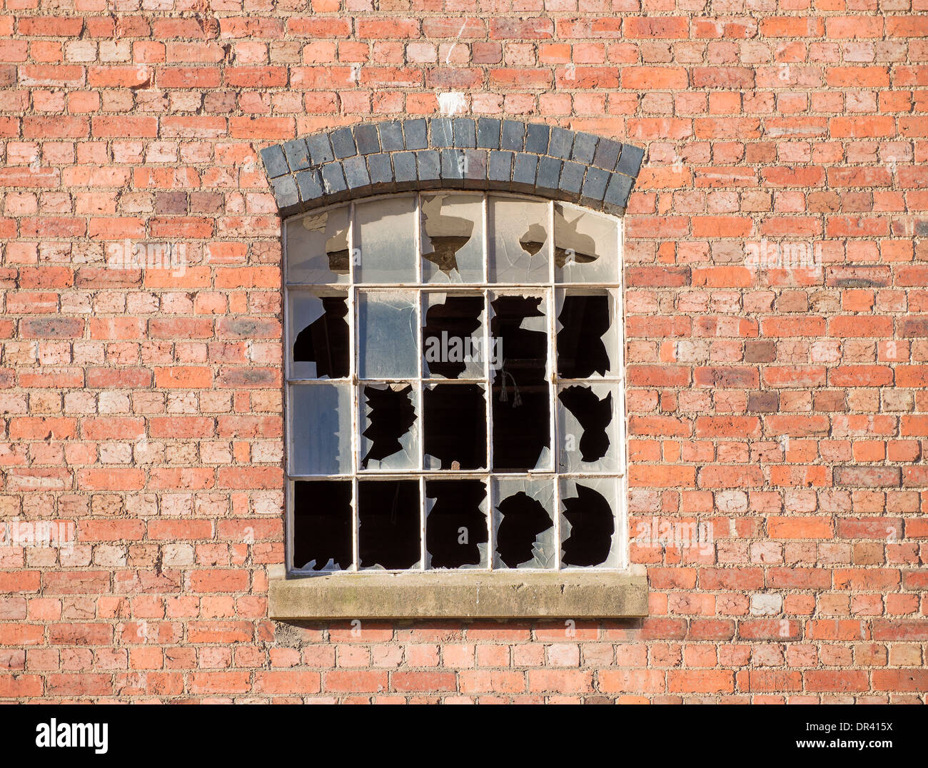 Smashed window panes Stock Photo
