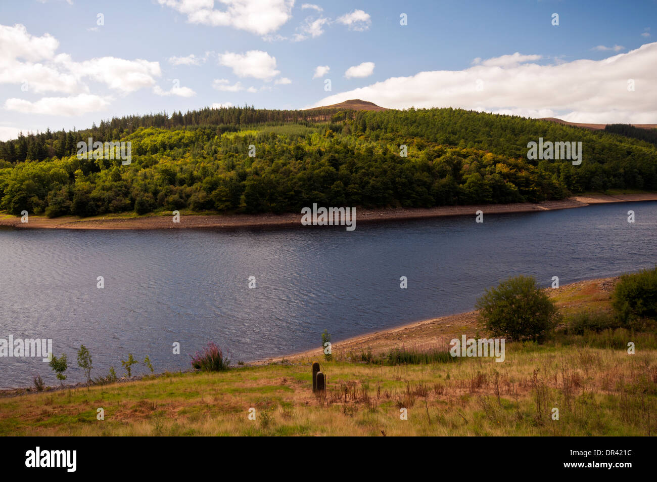 Win Hill summit seen from the A57 across Ladybower Reservoir in the Peak District National Park Stock Photo
