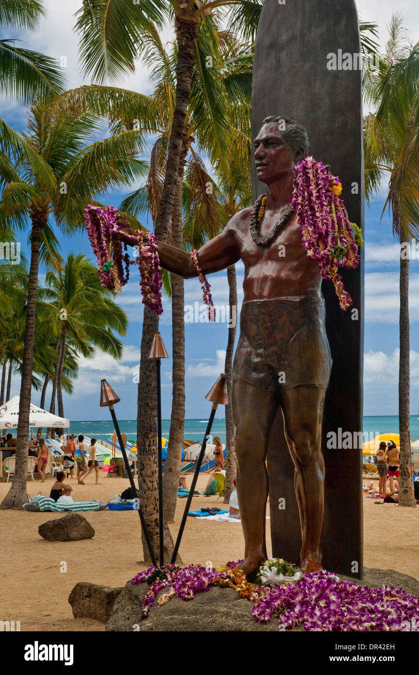 Flower Leis on statue of Duke Kahanamoku statue, Kuhio Beach Park, Waikiki Beach, Honolulu, Oahu, Hawaii Stock Photo