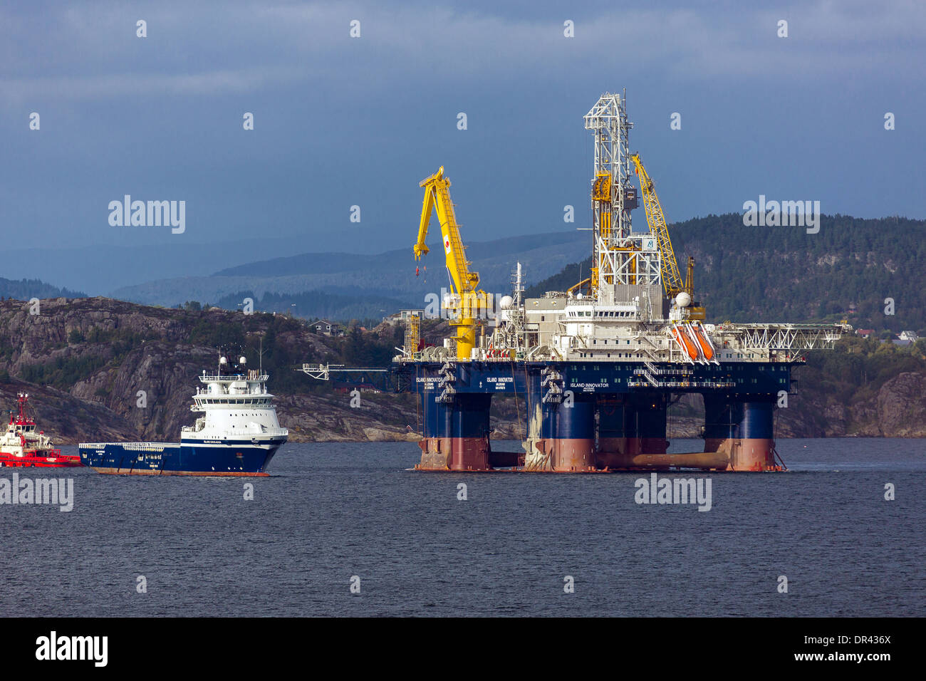 Oil Drilling rig Island Innovator and the Offshore Supply Ship Island Crusader Stock Photo