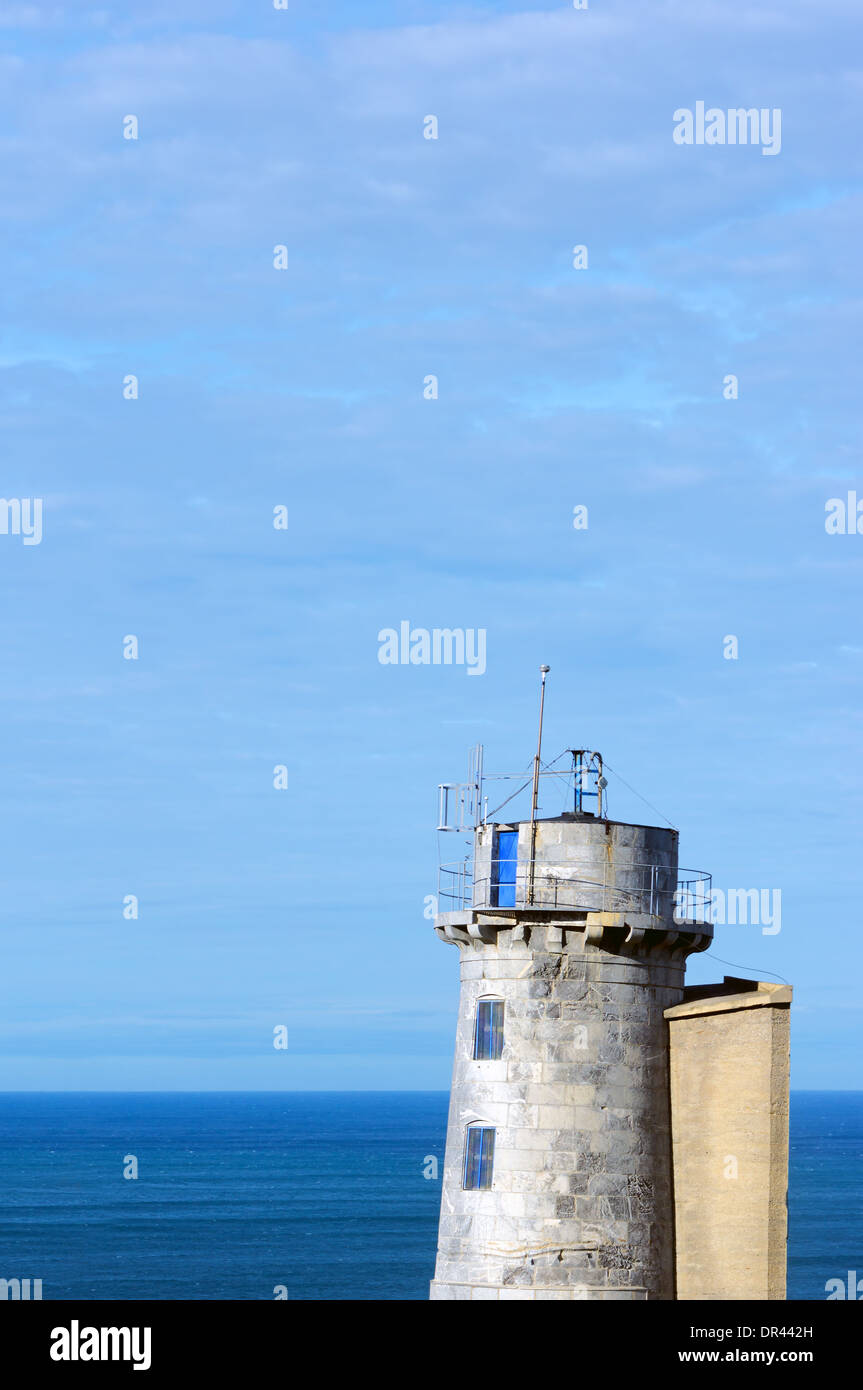 closeup of matxitxako old lighthouse near the sea Stock Photo