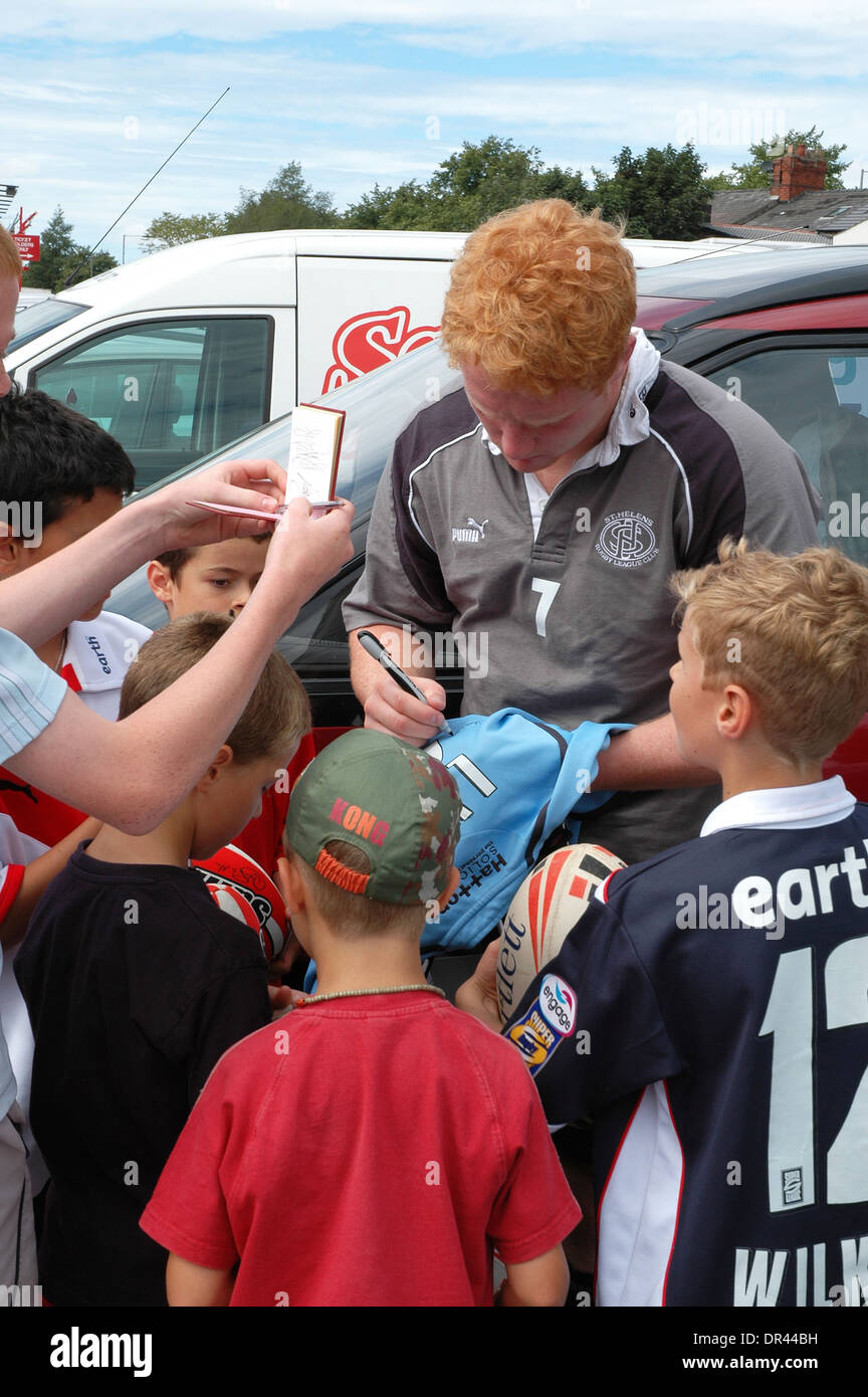 james graham st.helens rugby league player signing autographs for young fans Stock Photo