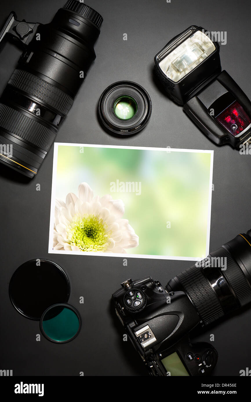camera and lense on black showing photographer still life Stock Photo