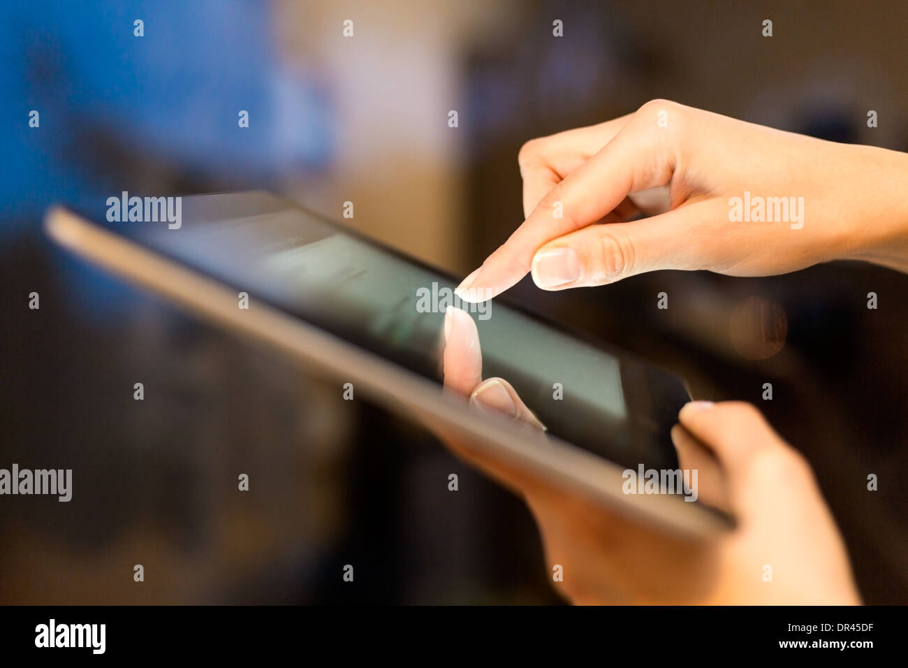 hand presses on screen digital tablet Stock Photo