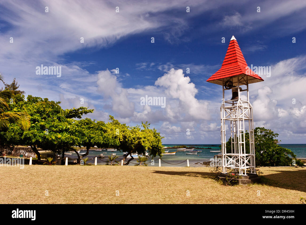 Brightly coloured bell tower of Notre Dame Auxiliatrice Roman catholic church, Cap Malheureux, Mauritius. Stock Photo