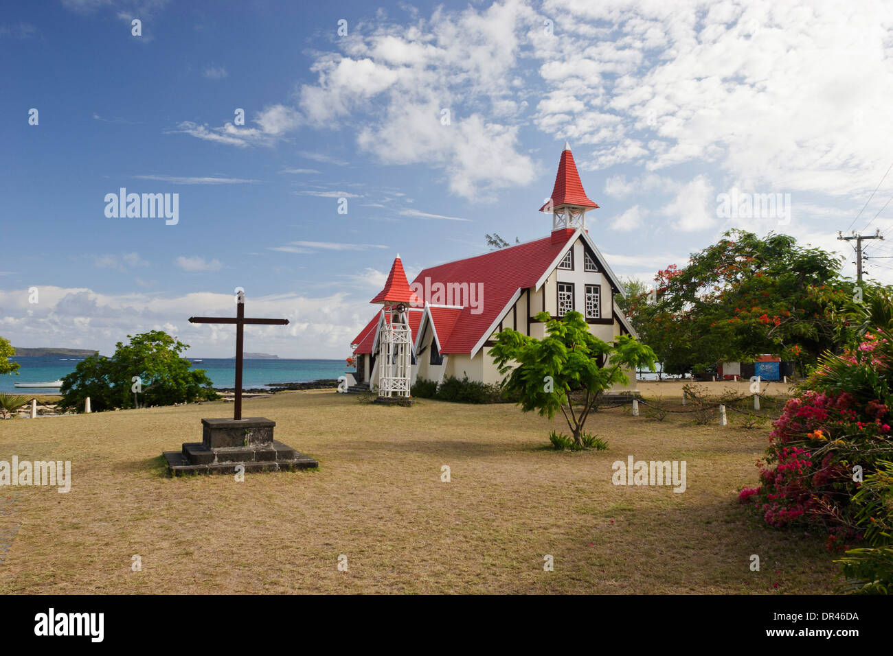 Brightly coloured Red Roof of Notre Dame Auxiliatrice Roman Catholic Church, Cap Malheureux, Mauritius. Stock Photo