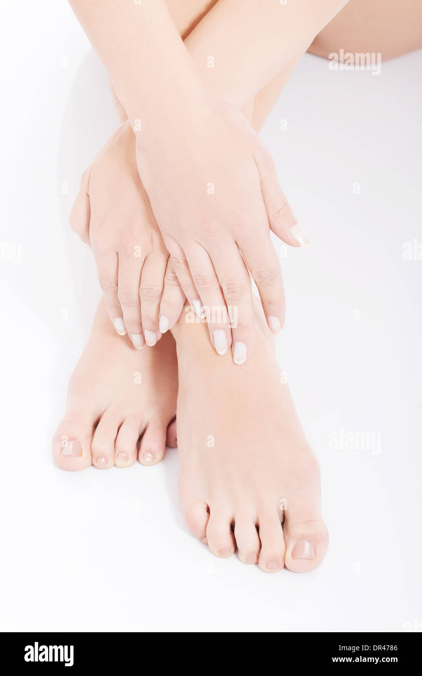 Beautiful fresh, clean feet with pedicure. Isolated on white Stock