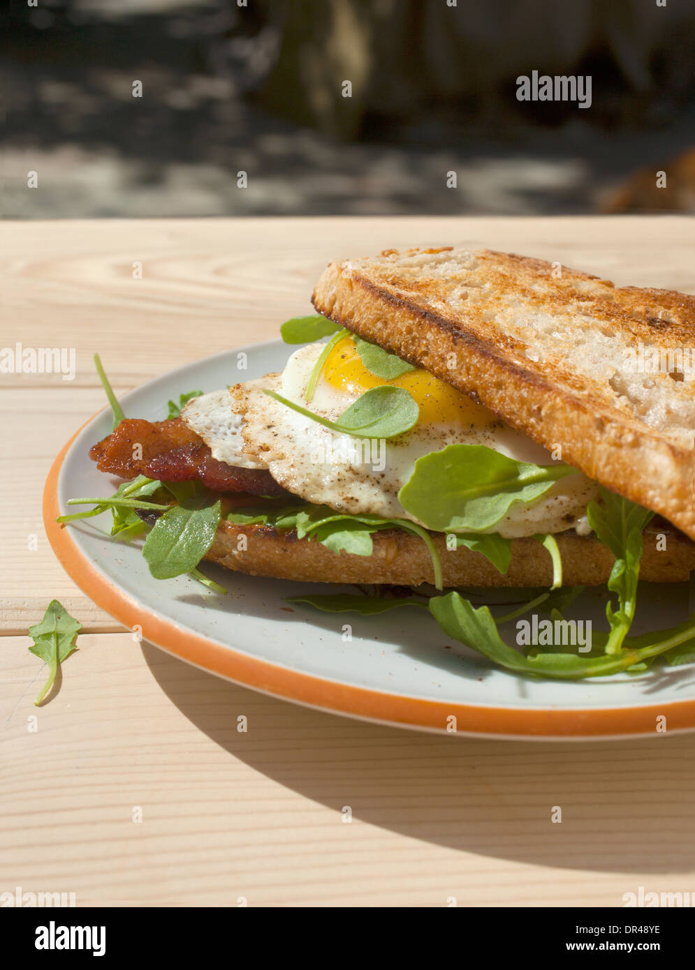 Open faced egg breakfast sandwich Stock Photo