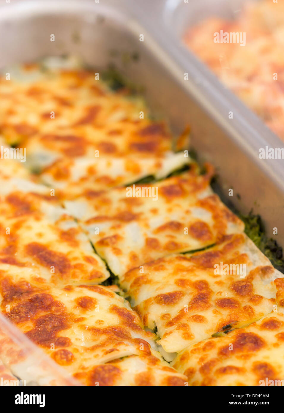 Lasagna spinach with aluminum tray in market Stock Photo Alamy