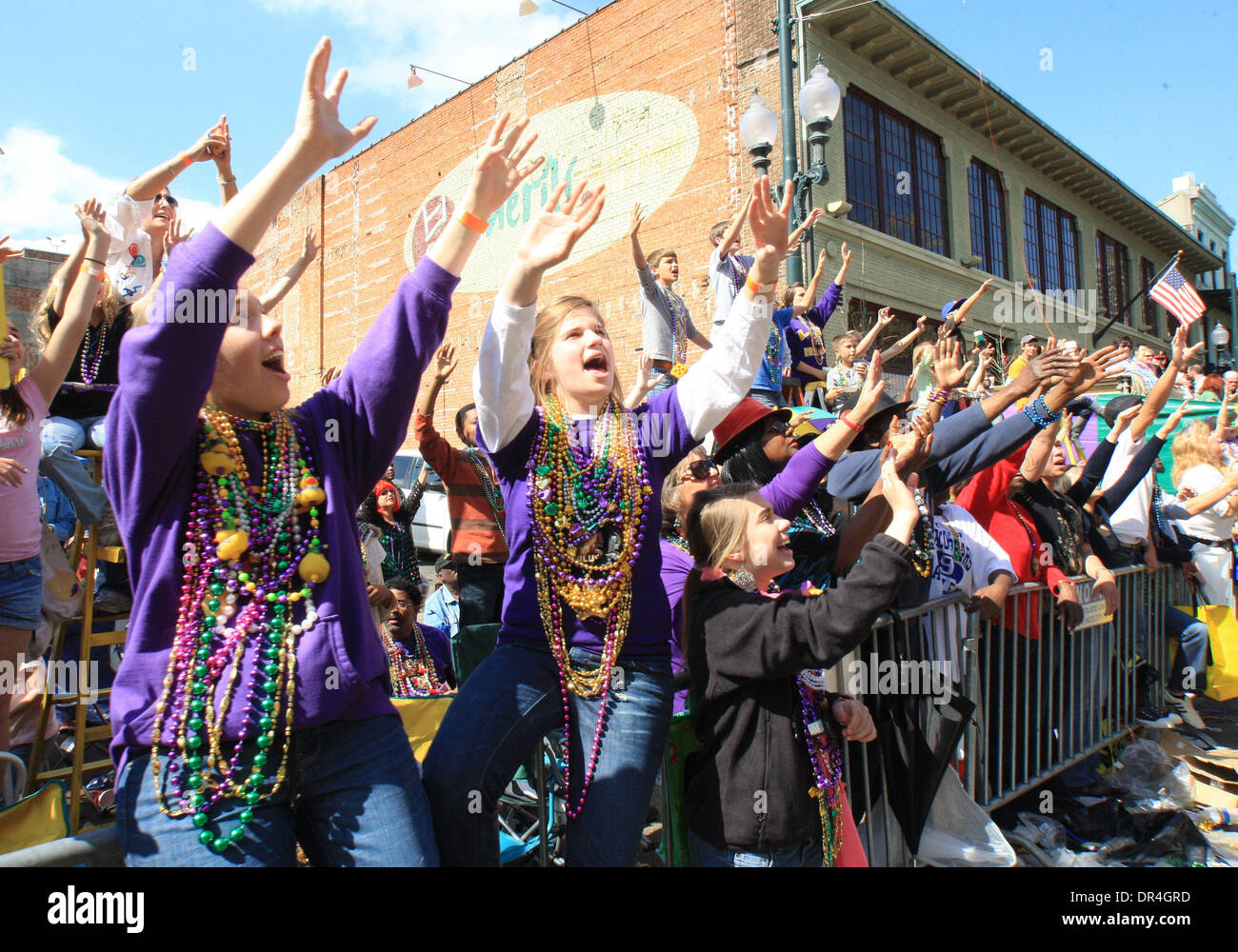 throwing mardi gras beads