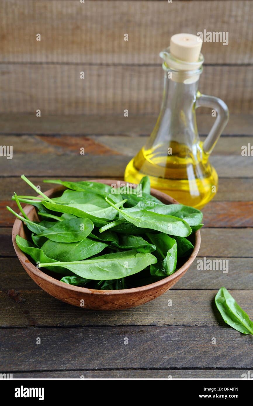 fresh spinach and sunflower oil, food Stock Photo Alamy