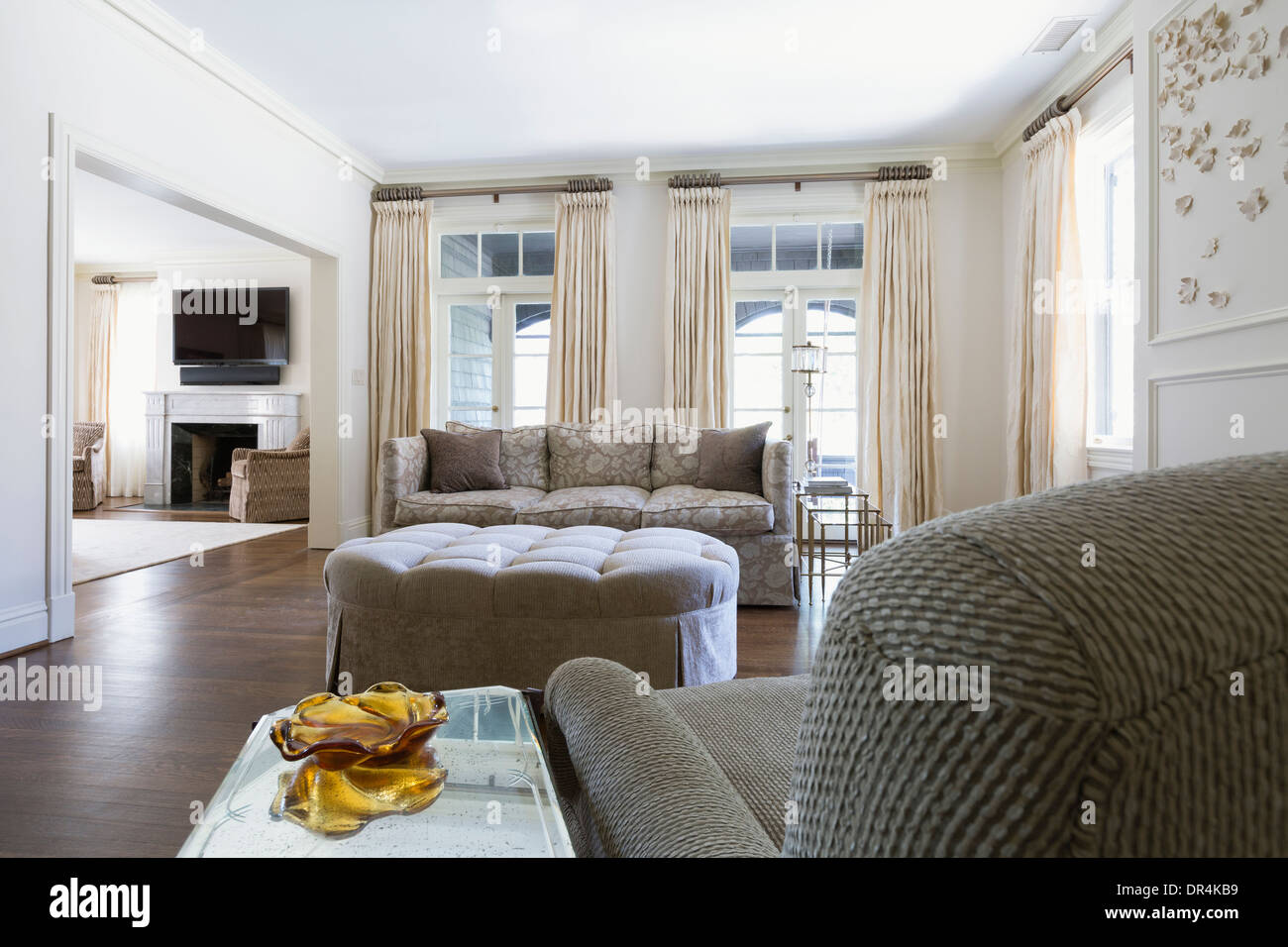 Armchair and sofa in ornate living room Stock Photo Alamy