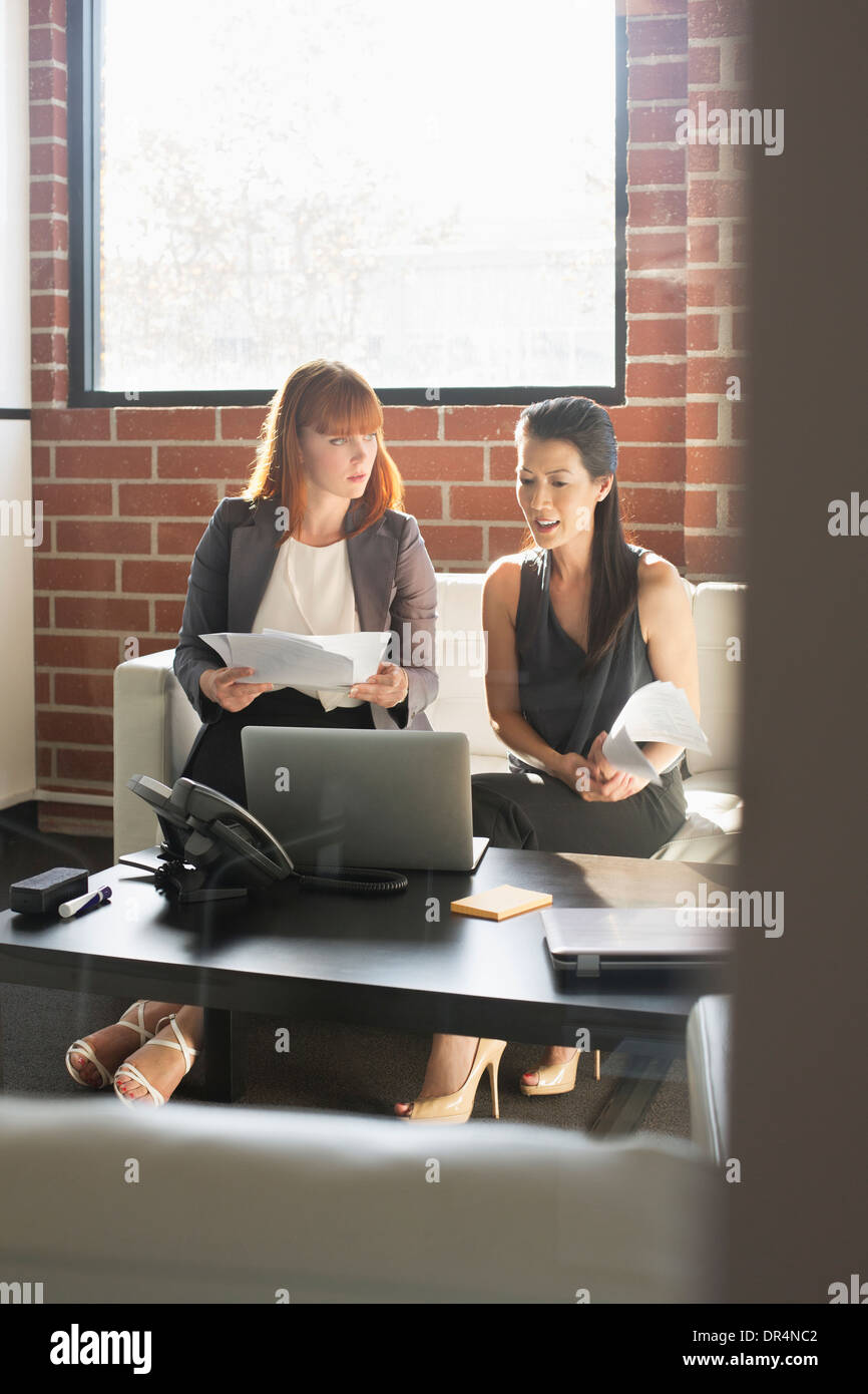 Businesswomen working together in office Stock Photo - Alamy
