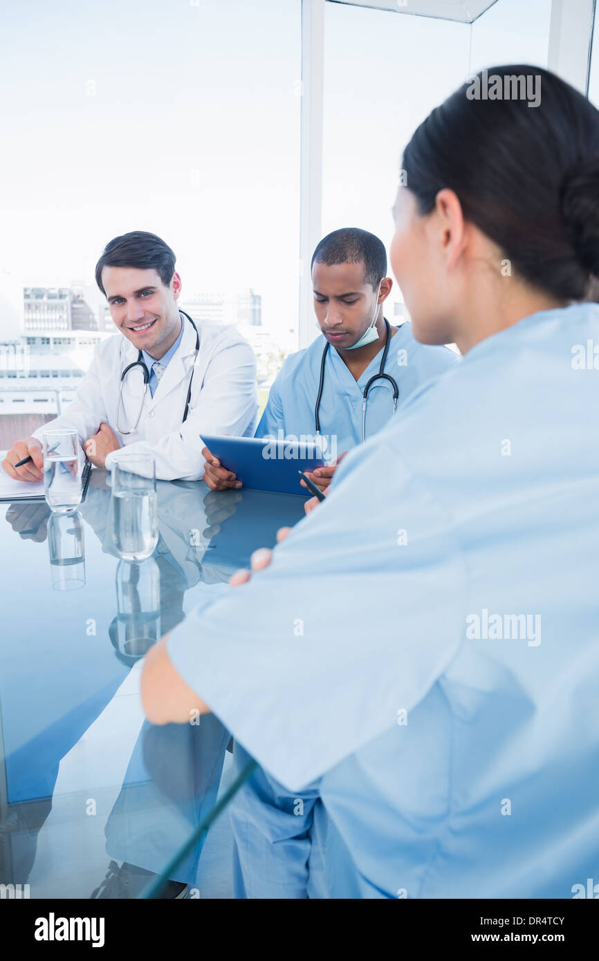 Team group doctors tablet pc hi-res stock photography and images - Alamy