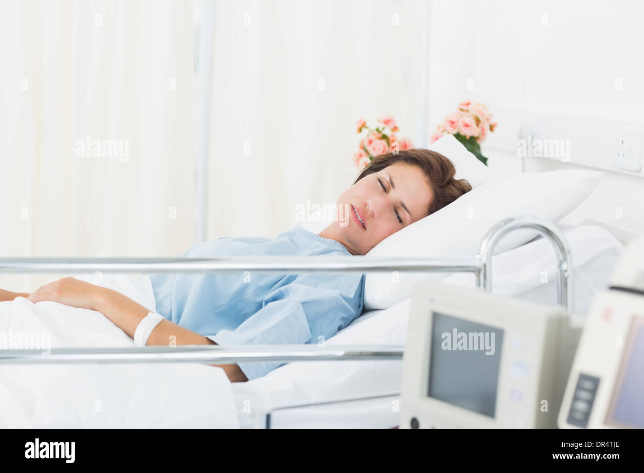 Woman asleep in hospital bed hires stock photography and images Alamy