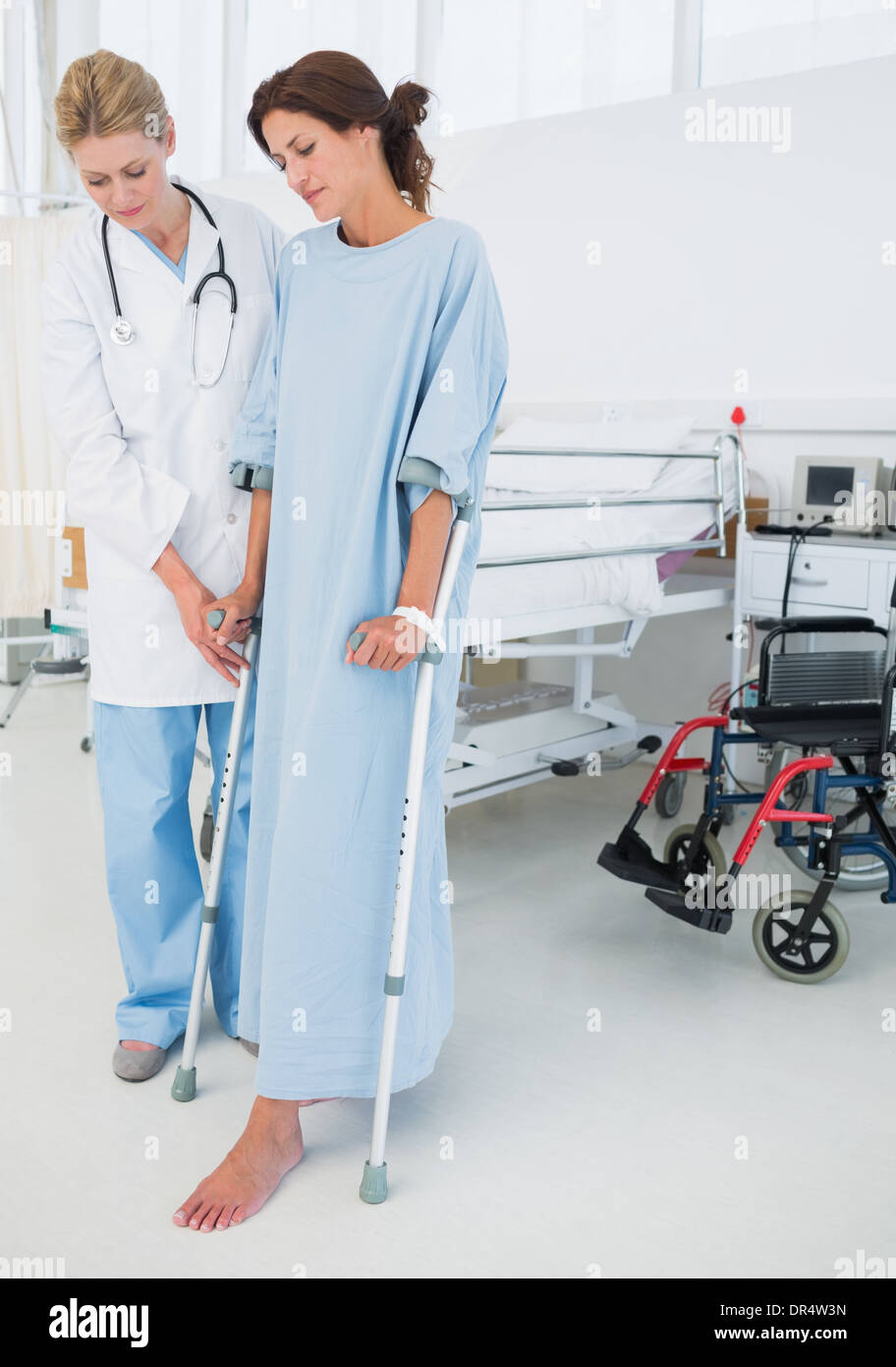 Doctor patient hospital gown hi-res stock photography and images - Alamy