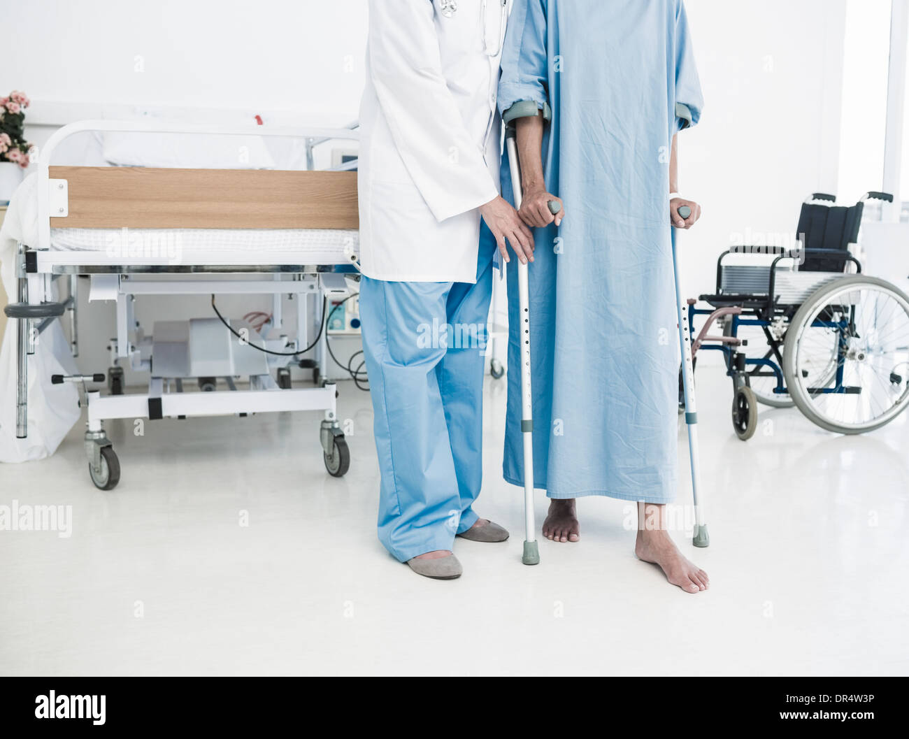 Doctor patient hospital gown hi-res stock photography and images - Alamy