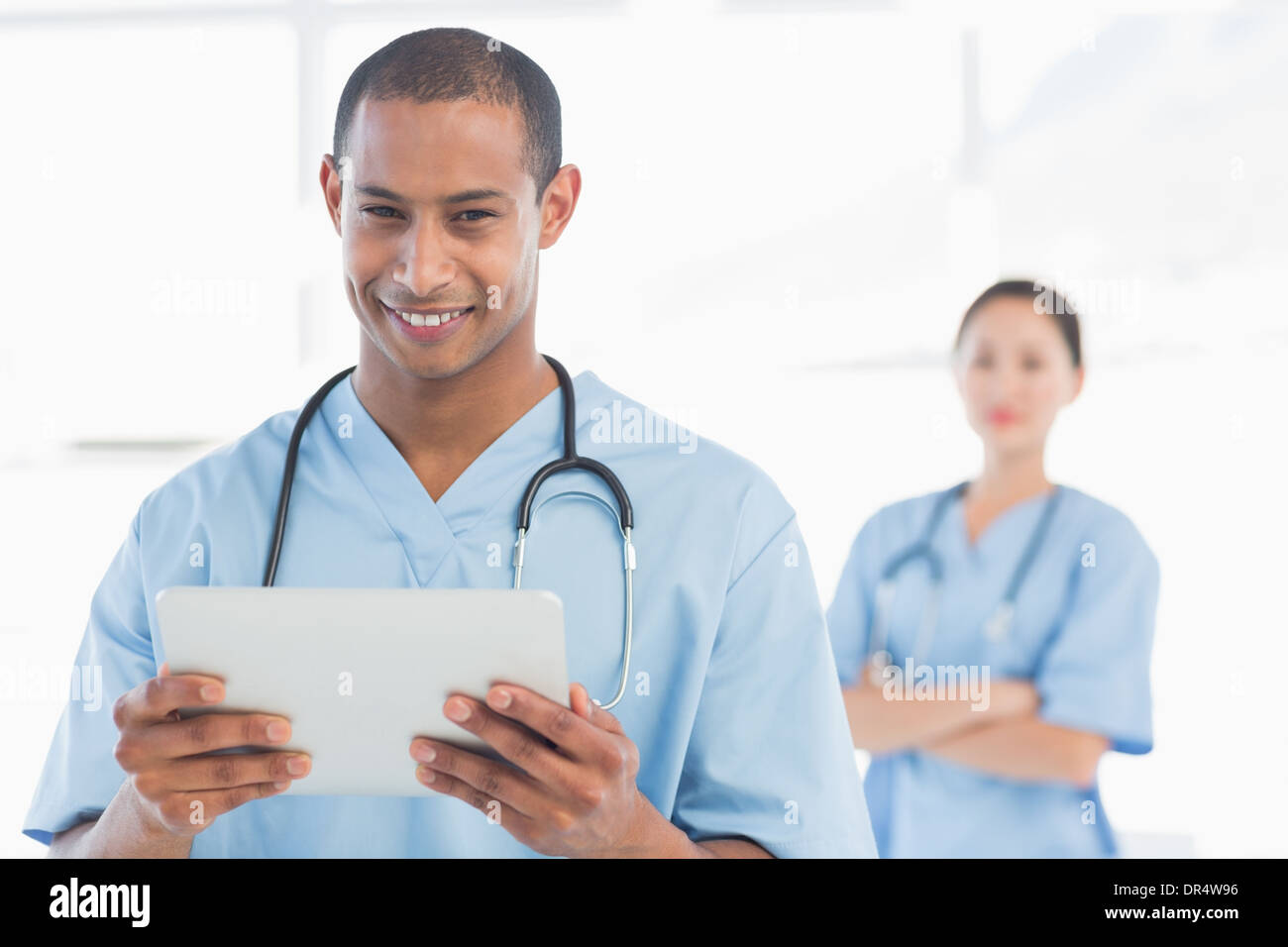 Handsome asian doctor man hi-res stock photography and images - Alamy