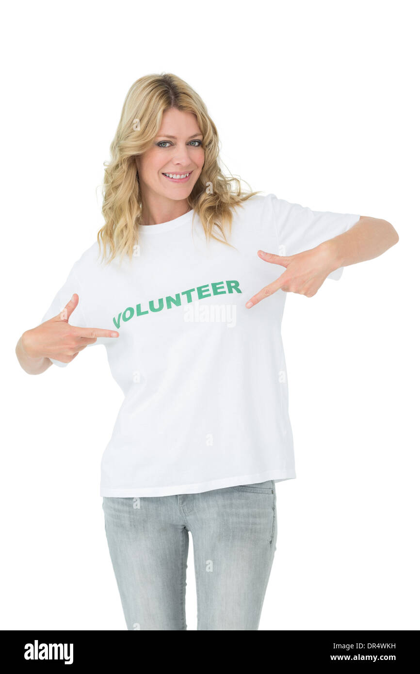 Portrait of a happy female volunteer pointing to herself Stock Photo ...
