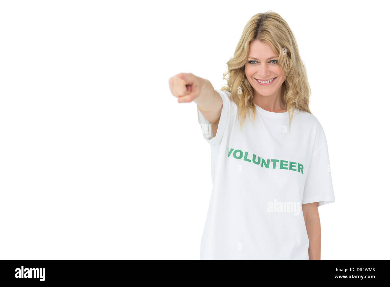 Portrait of a happy female volunteer pointing at you Stock Photo - Alamy