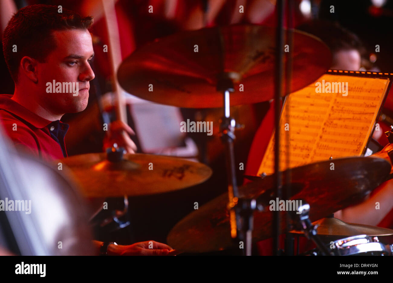 A drummer works hard during a jazz orchestra live performance in south