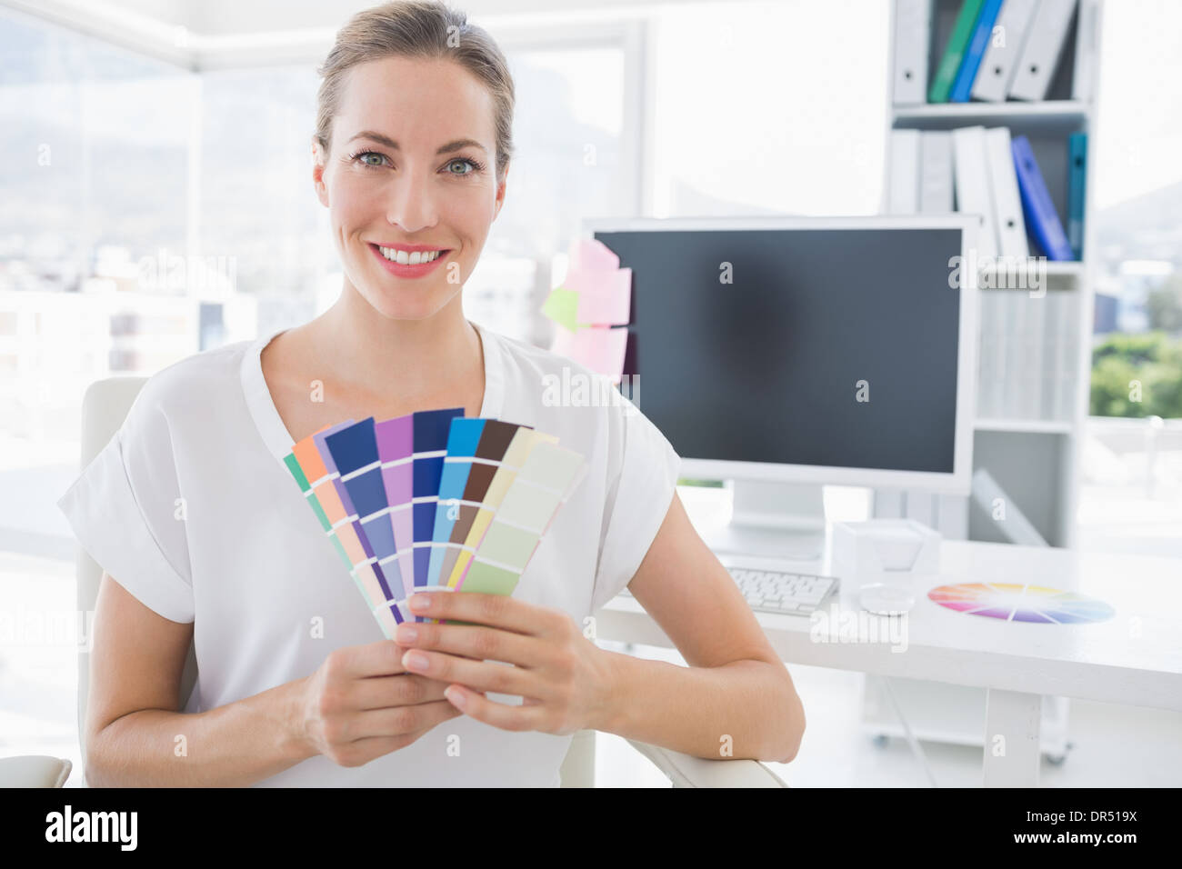 Portrait of a photo editor holding colors Stock Photo