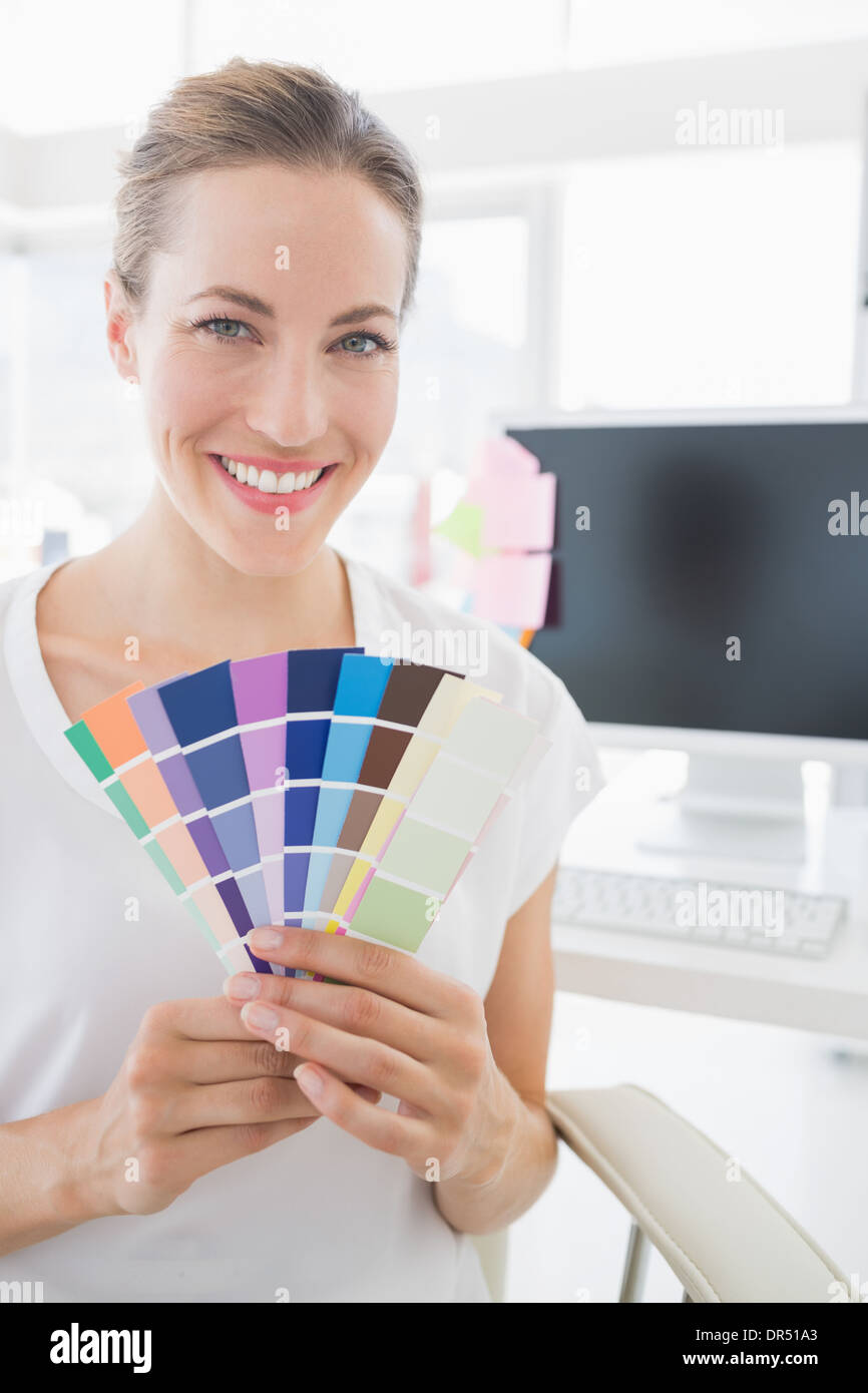 Portrait of a photo editor holding colors Stock Photo Alamy