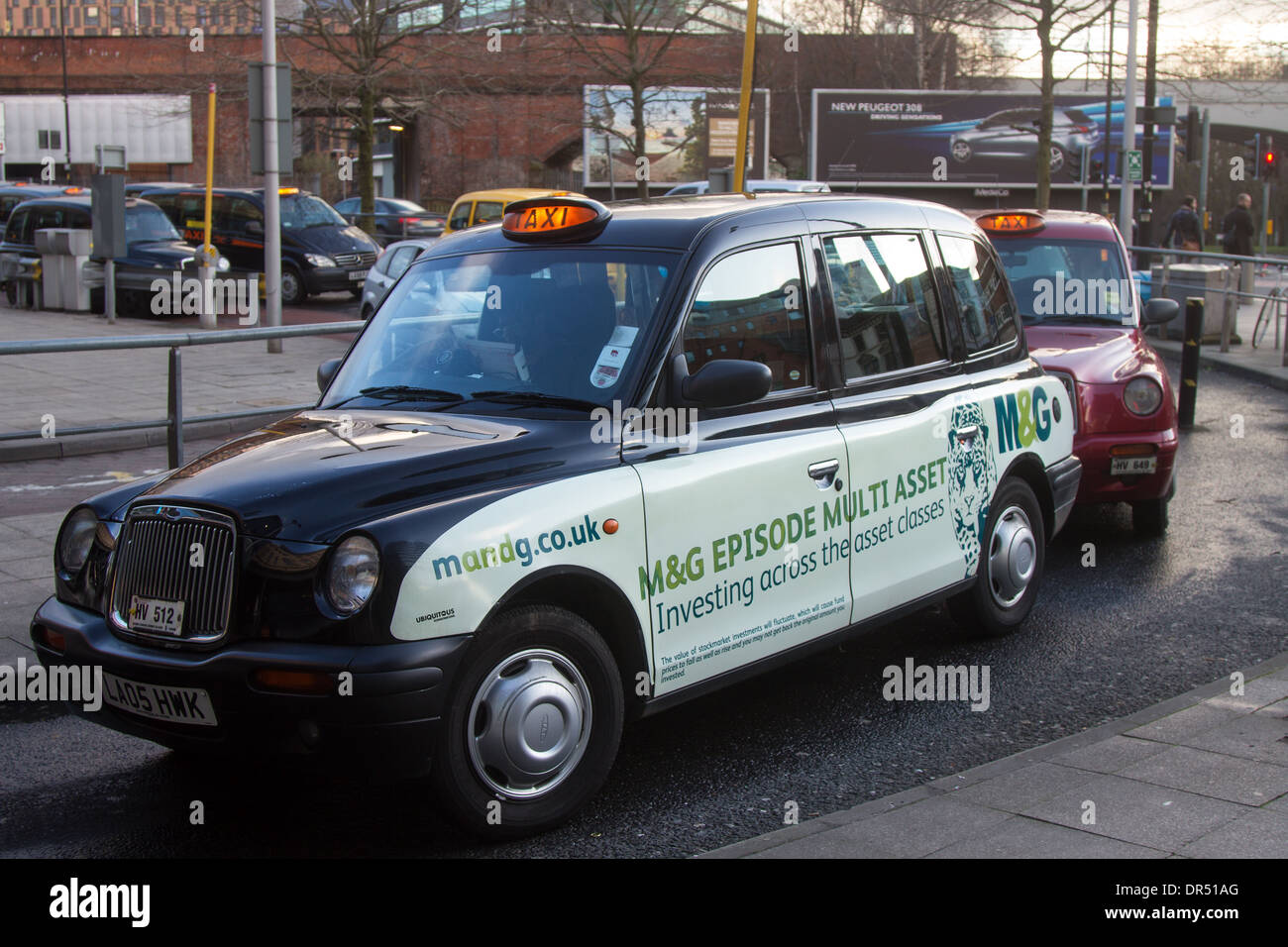 Hackney Cabs, Taxicab (hackney carriage), TX4  Private, Hire Vehicles for hire  Taxis in Manchester City Centre, Lancashire, UK Stock Photo