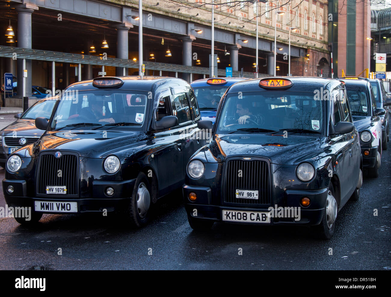 Hackney Cabs, Private Hire Vehicles for hire  Taxi Fleet in Manchester City Centre, Lancashire, UK Stock Photo