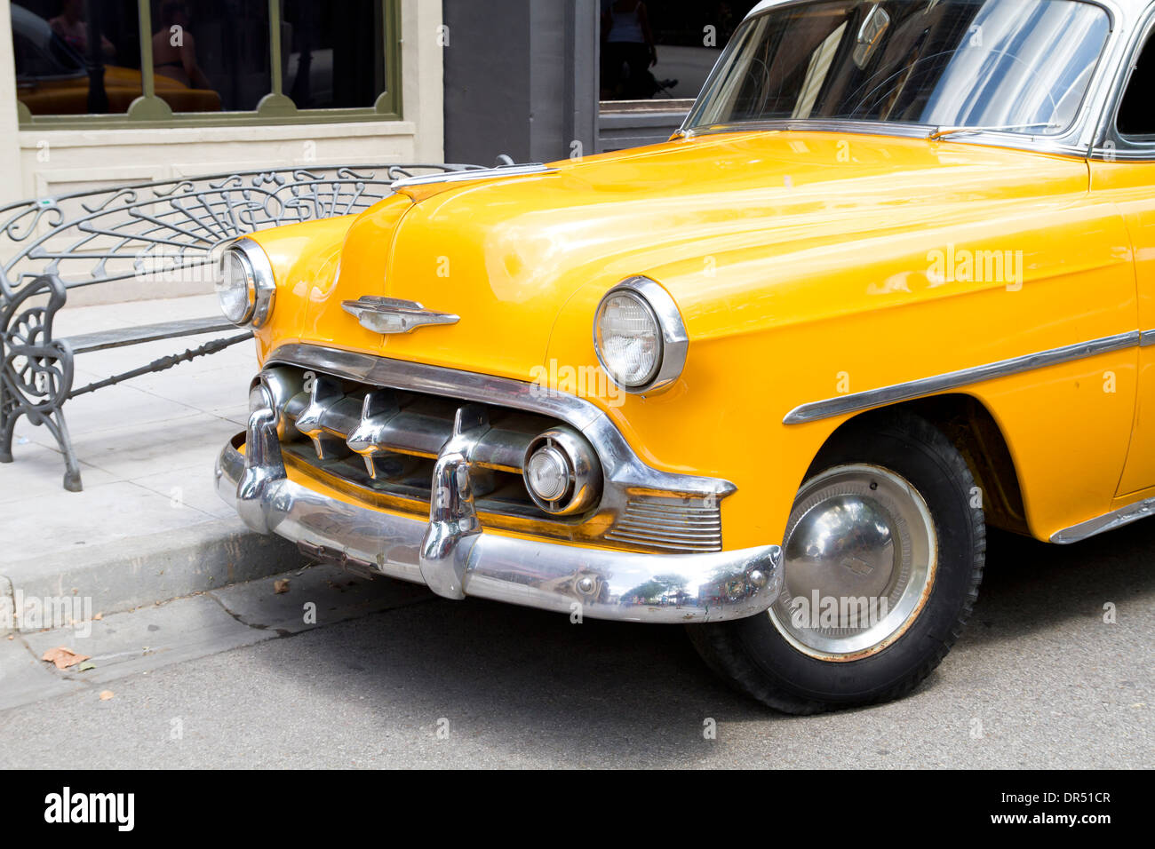 yellow 50's vintage car parked in the street Stock Photo - Alamy