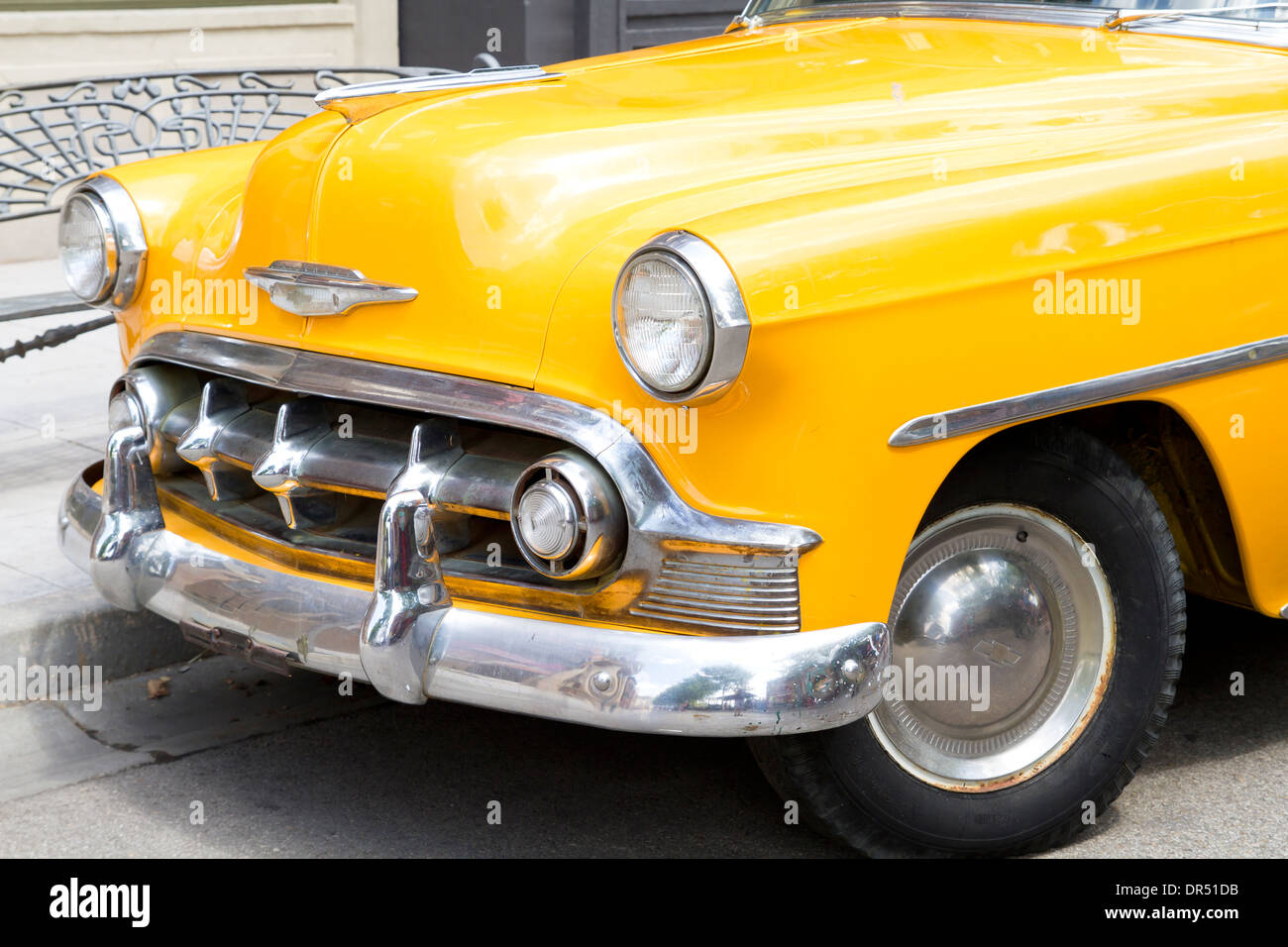 yellow 50's vintage car parked in the street Stock Photo - Alamy