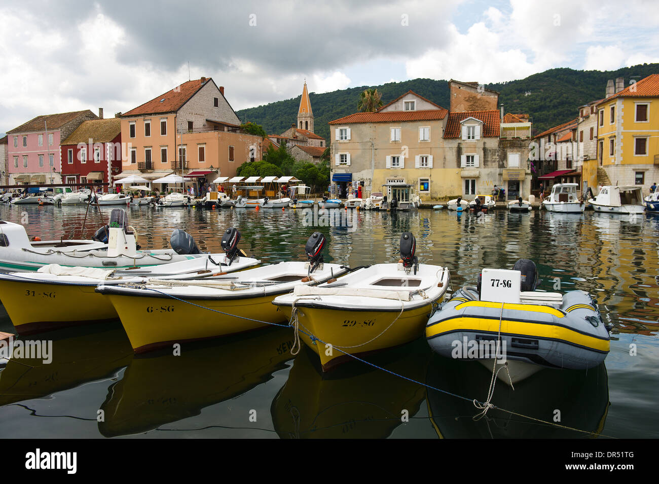 Boats moored at Stari Grad Port in Croatia Stock Photo